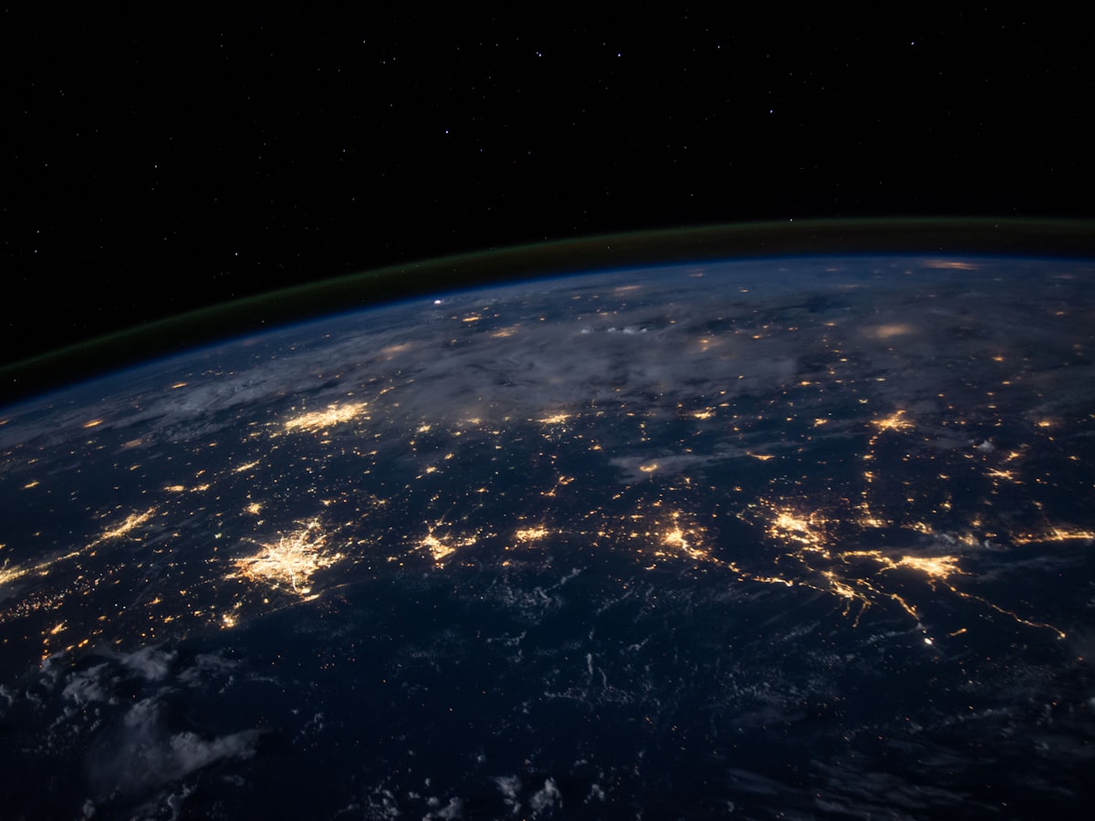 Earth at night with glowing city lights